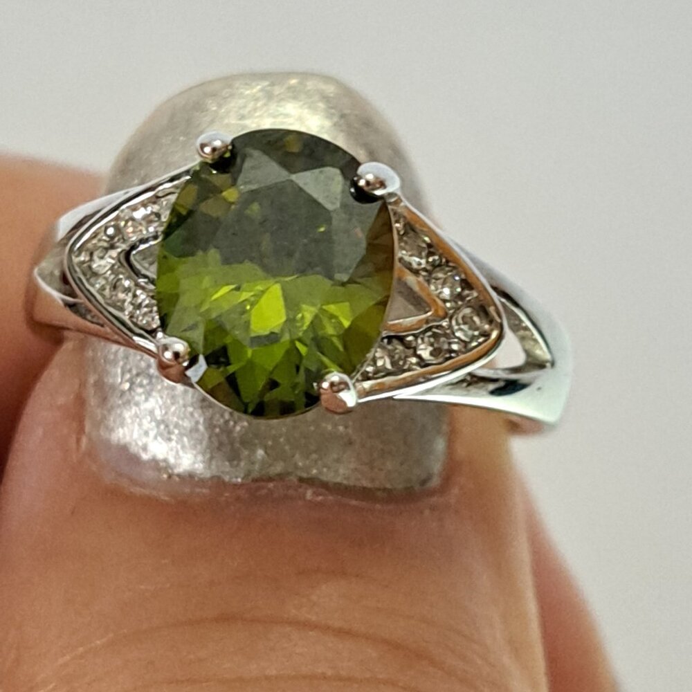 Brilliant Silver Ring with Peridot Green Colored Stone with CZ smaller stones - Picture 2 of 6